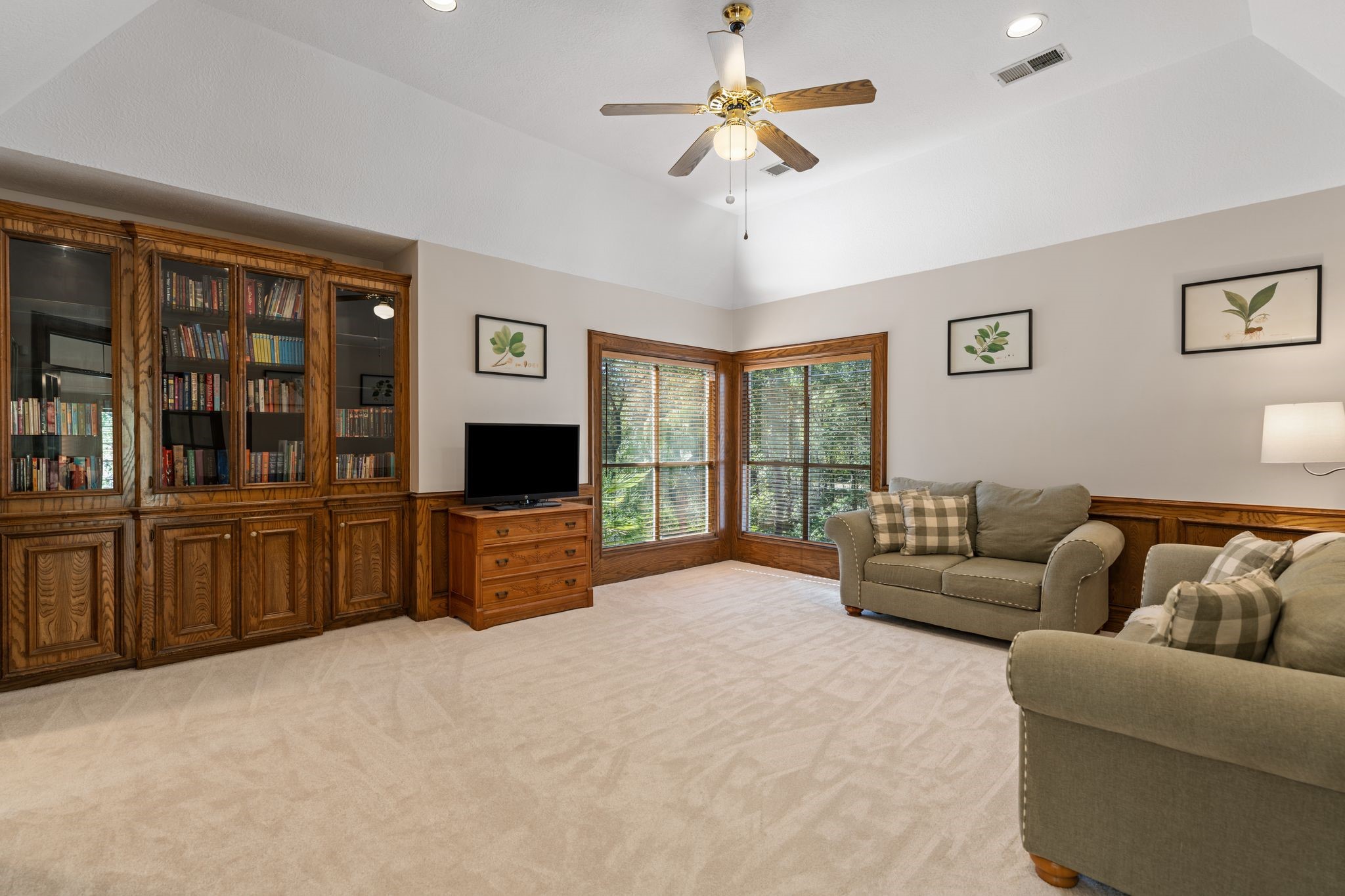 2 Bridgeberry Court Spring, TX 77381 - Photo 26 of 50 a living room with furniture and a flat screen tv