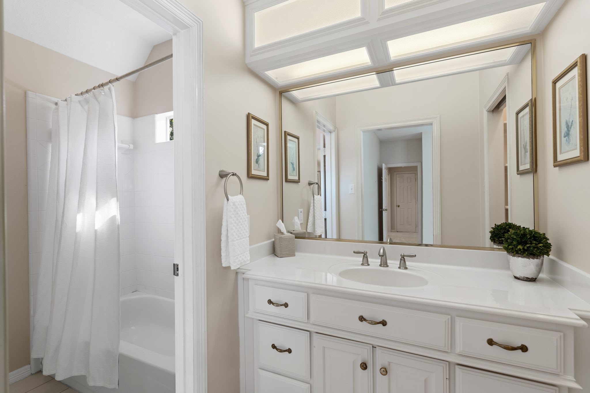 2 Bridgeberry Court Spring, TX 77381 - Photo 29 of 50 a bathroom with a double vanity sink mirror and double