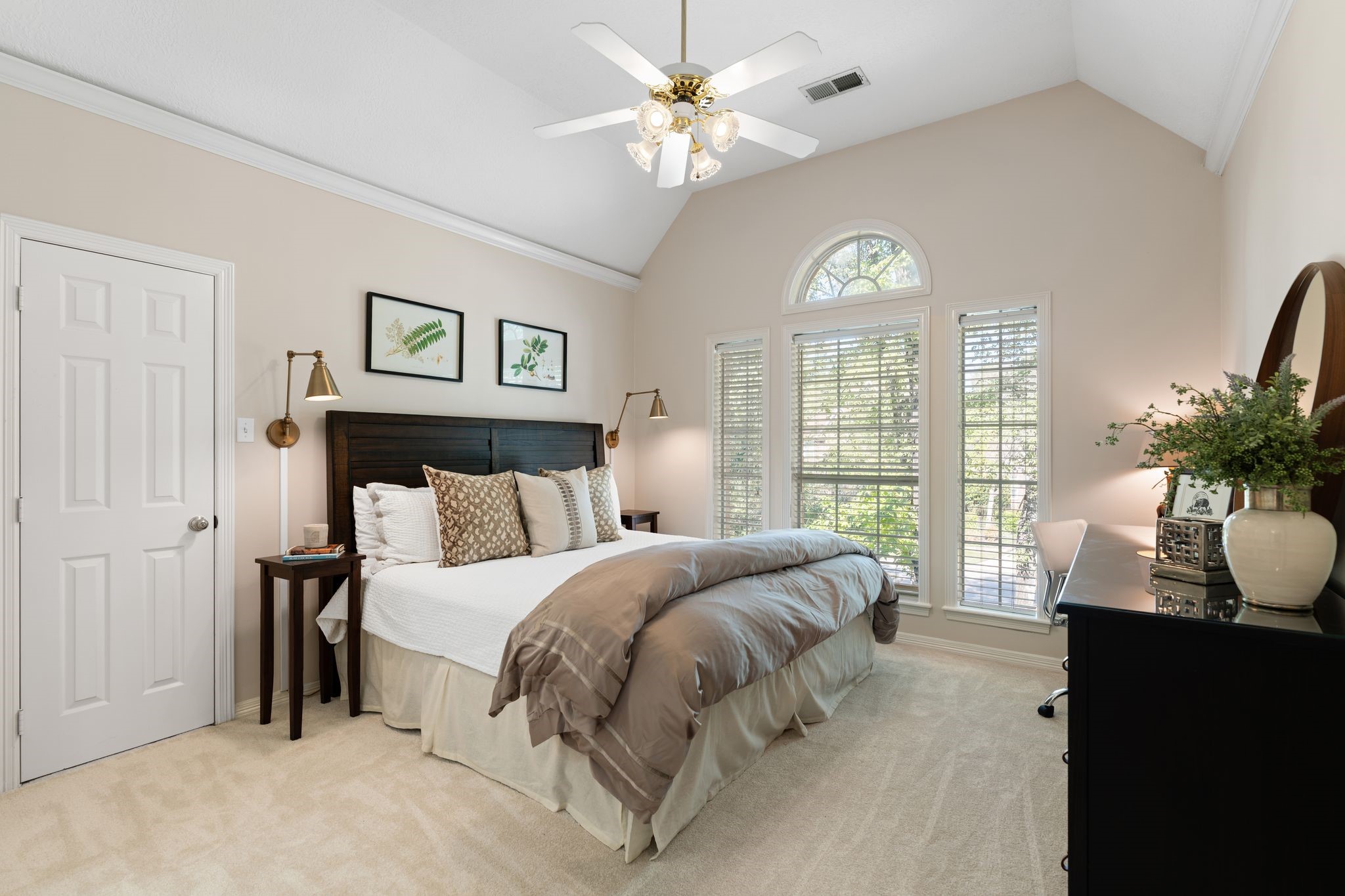 2 Bridgeberry Court Spring, TX 77381 - Photo 32 of 50 a spacious bedroom with a bed and a chandelier