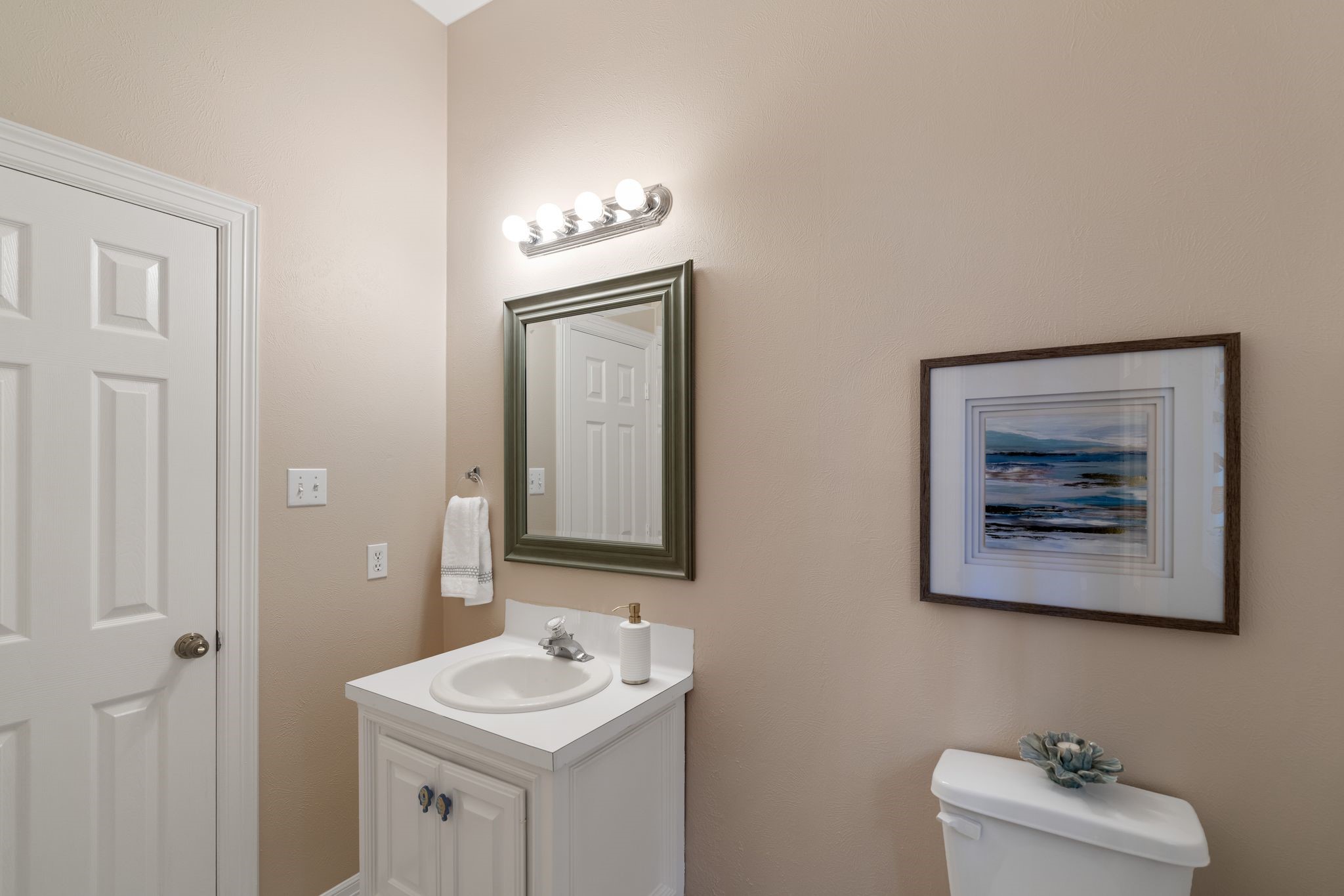2 Bridgeberry Court Spring, TX 77381 - Photo 34 of 50 a bathroom with a toilet a sink and mirror