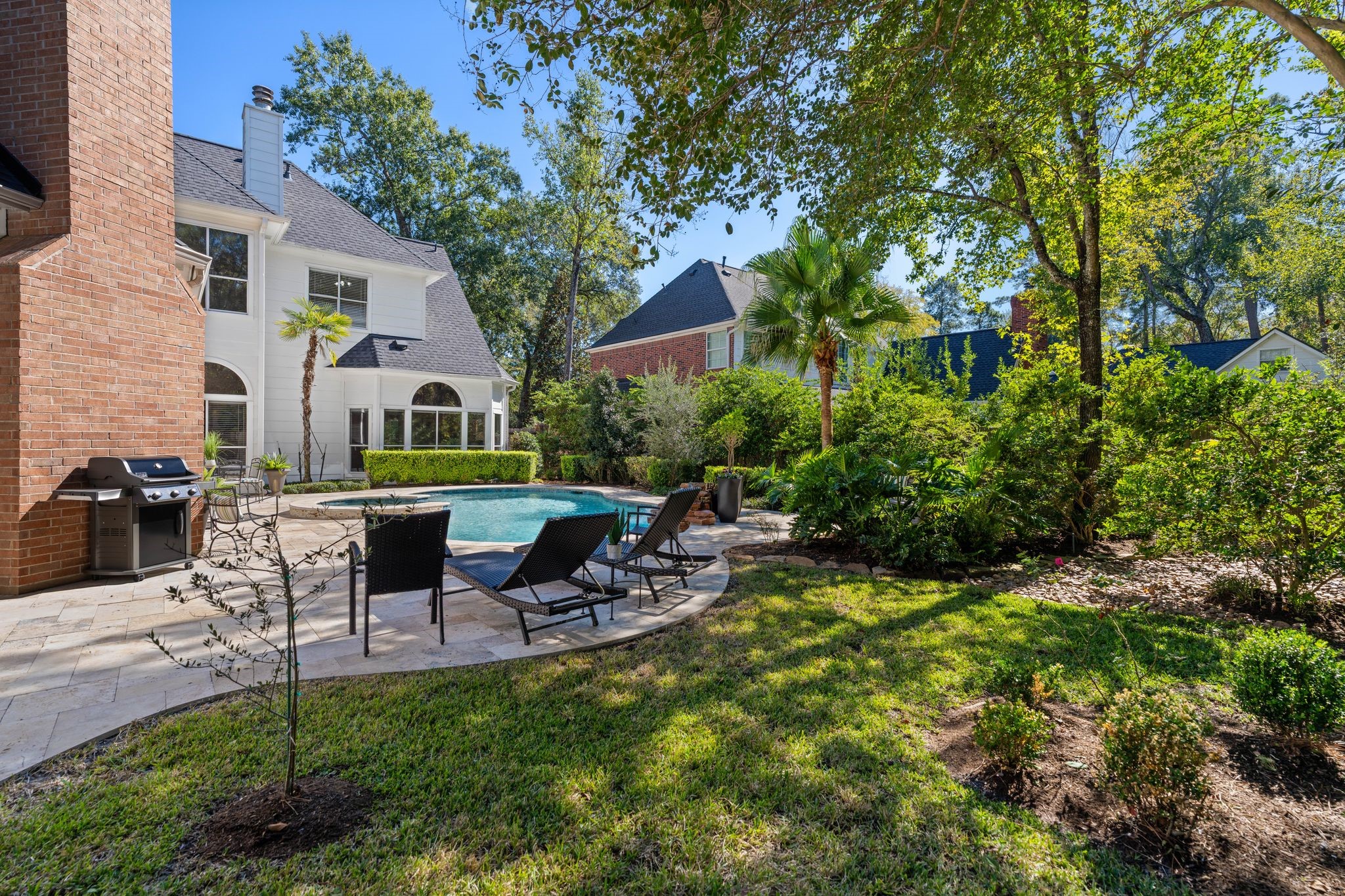 2 Bridgeberry Court Spring, TX 77381 - Photo 37 of 50 a view of a patio with table and chairs and potted plants