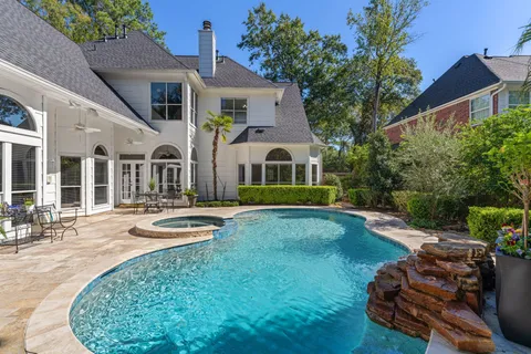 a front view of house with yard and outdoor seating