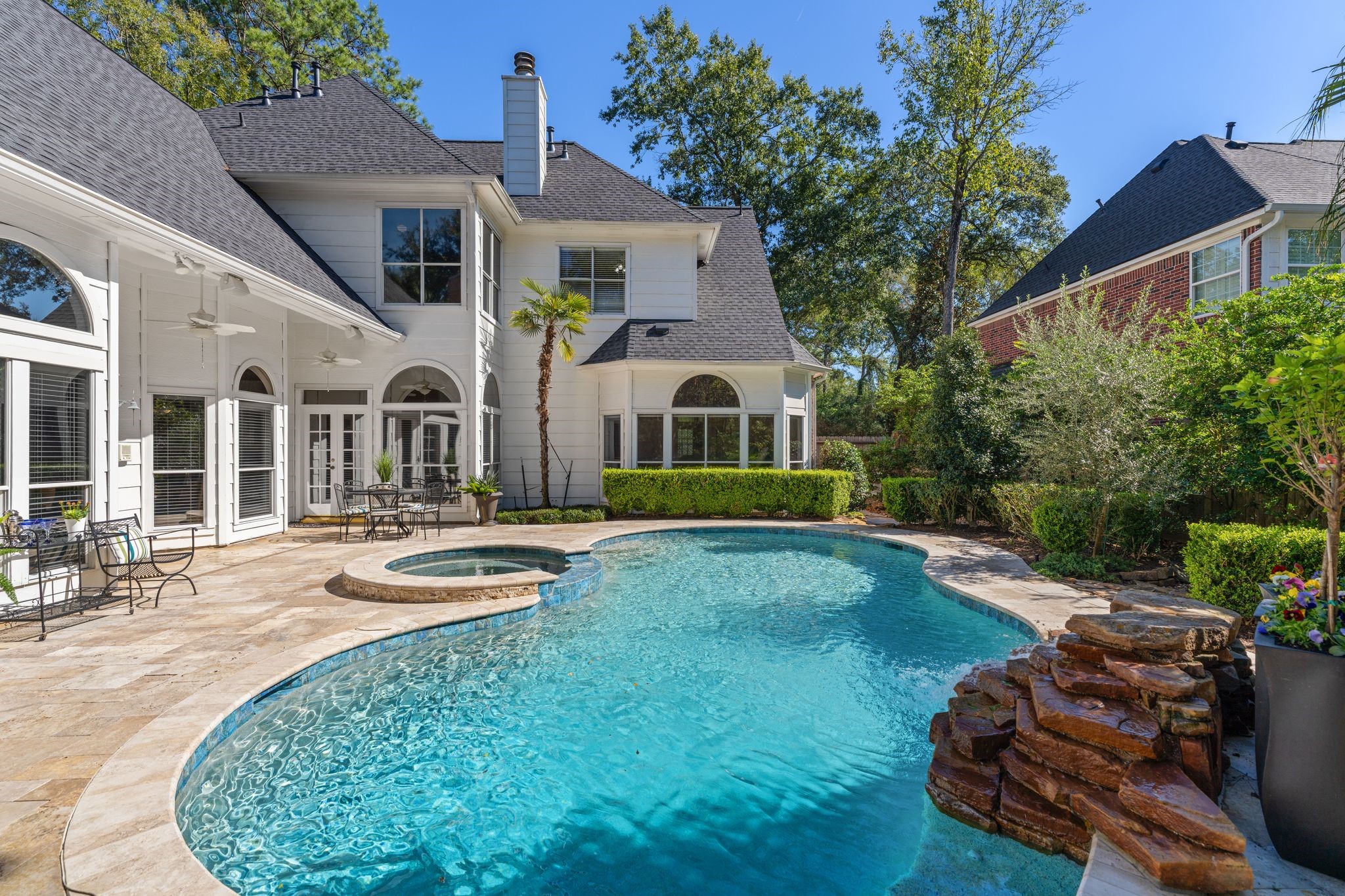 2 Bridgeberry Court Spring, TX 77381 - Photo 39 of 50 a front view of house with yard and outdoor seating