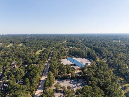 a view of a swimming pool with lounge chair