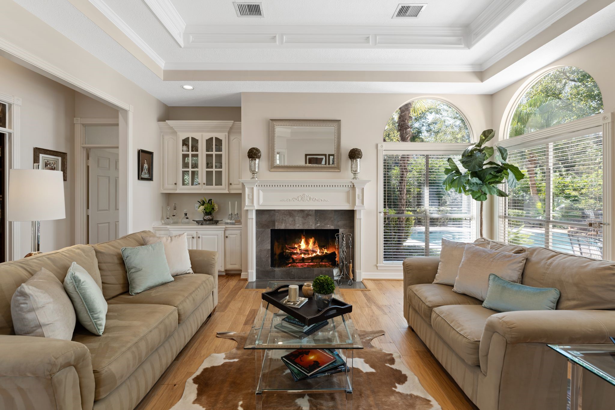 2 Bridgeberry Court Spring, TX 77381 - Photo 6 of 50 a living room with furniture and a fireplace