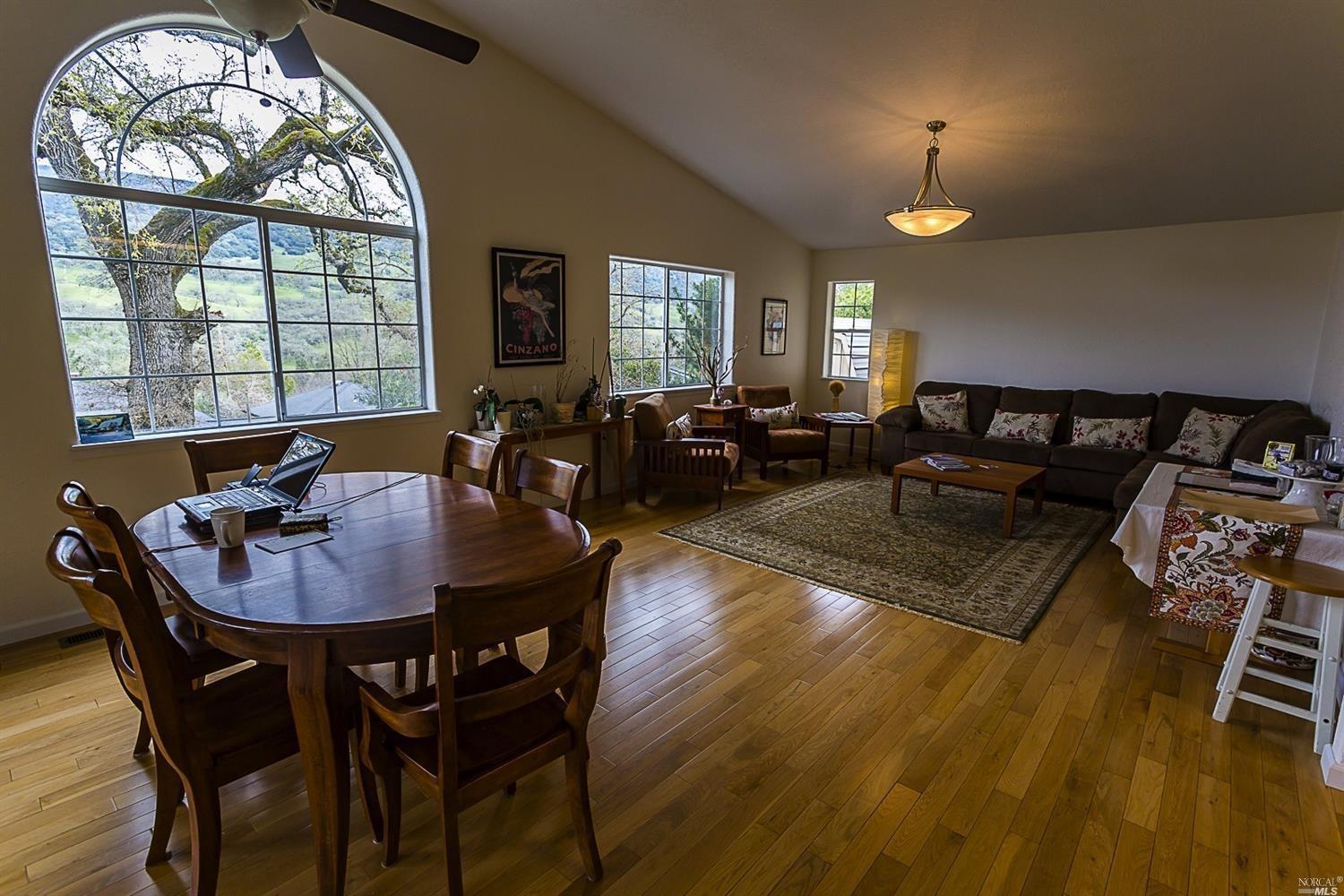 760 Riverside Drive Ukiah, CA 95482 - Photo 1 of 1 a living room with furniture and a large window