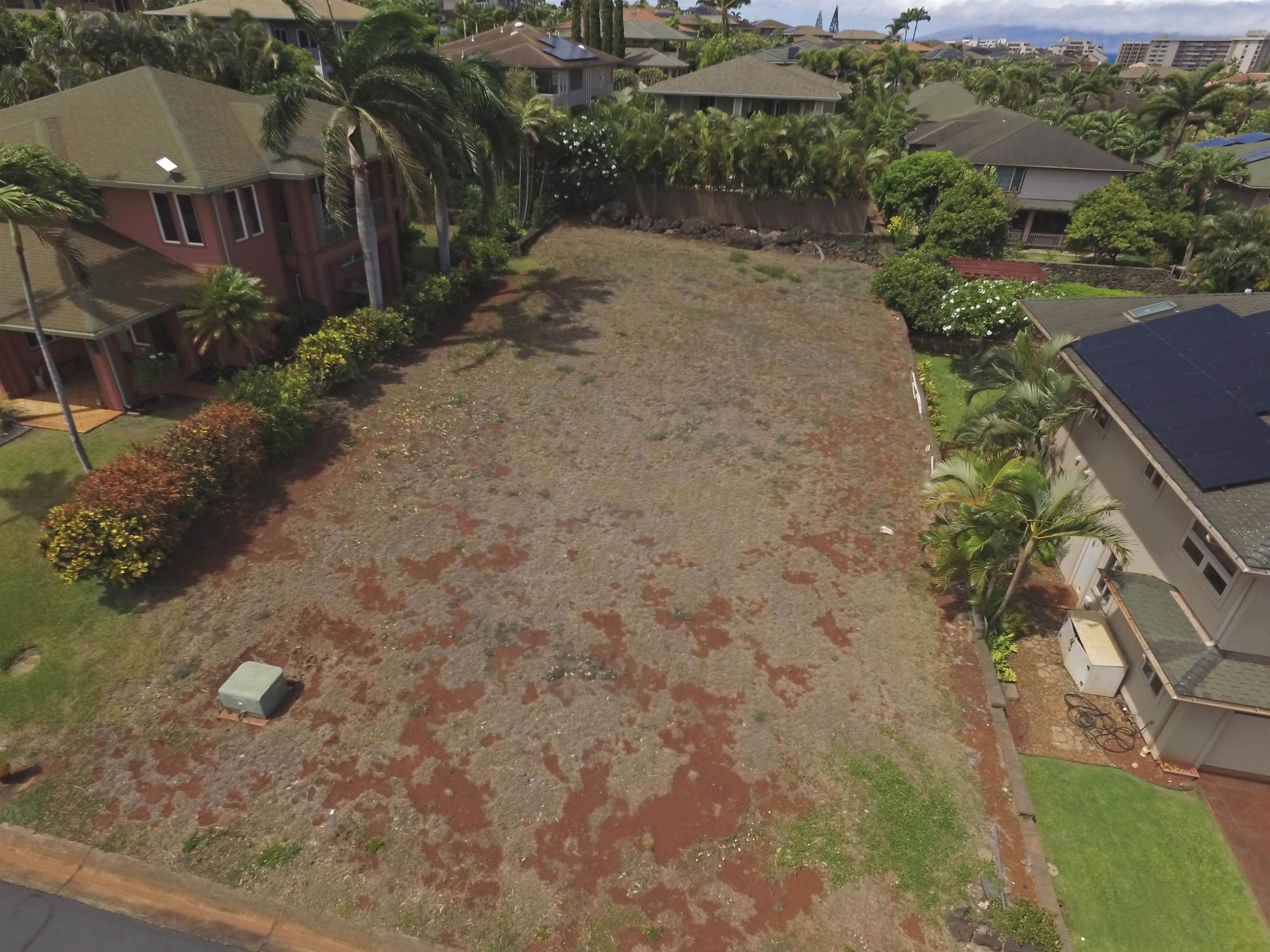 225 Kahana Ridge Drive, Unit 225 KAHANA RIDGE DR Lahaina, HI 96761 - Photo 13 of 15 an aerial view of a house with a yard and trees all around
