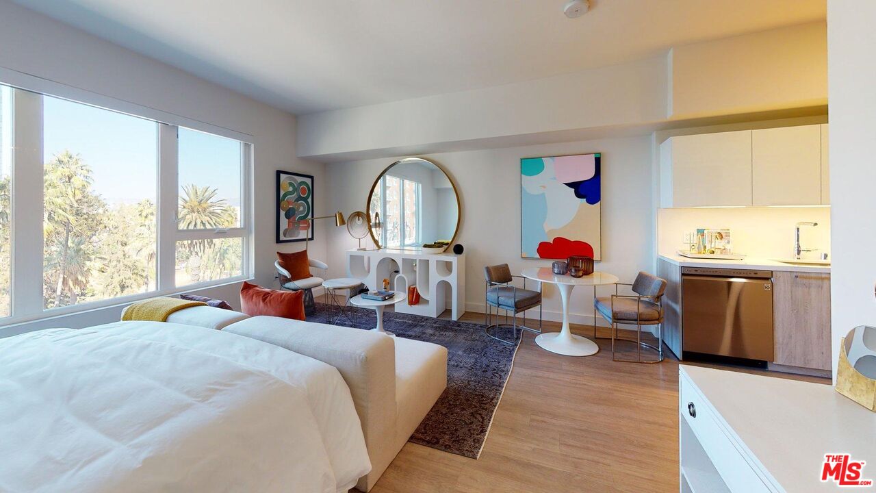 2801 Sunset Place, Unit 2213 Los Angeles, CA 90005 - Photo 3 of 7 a bed room with a bed and a windows