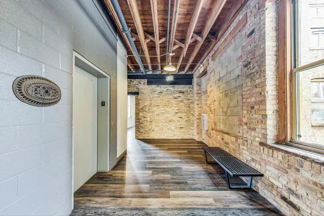 a view of entryway with wooden floor