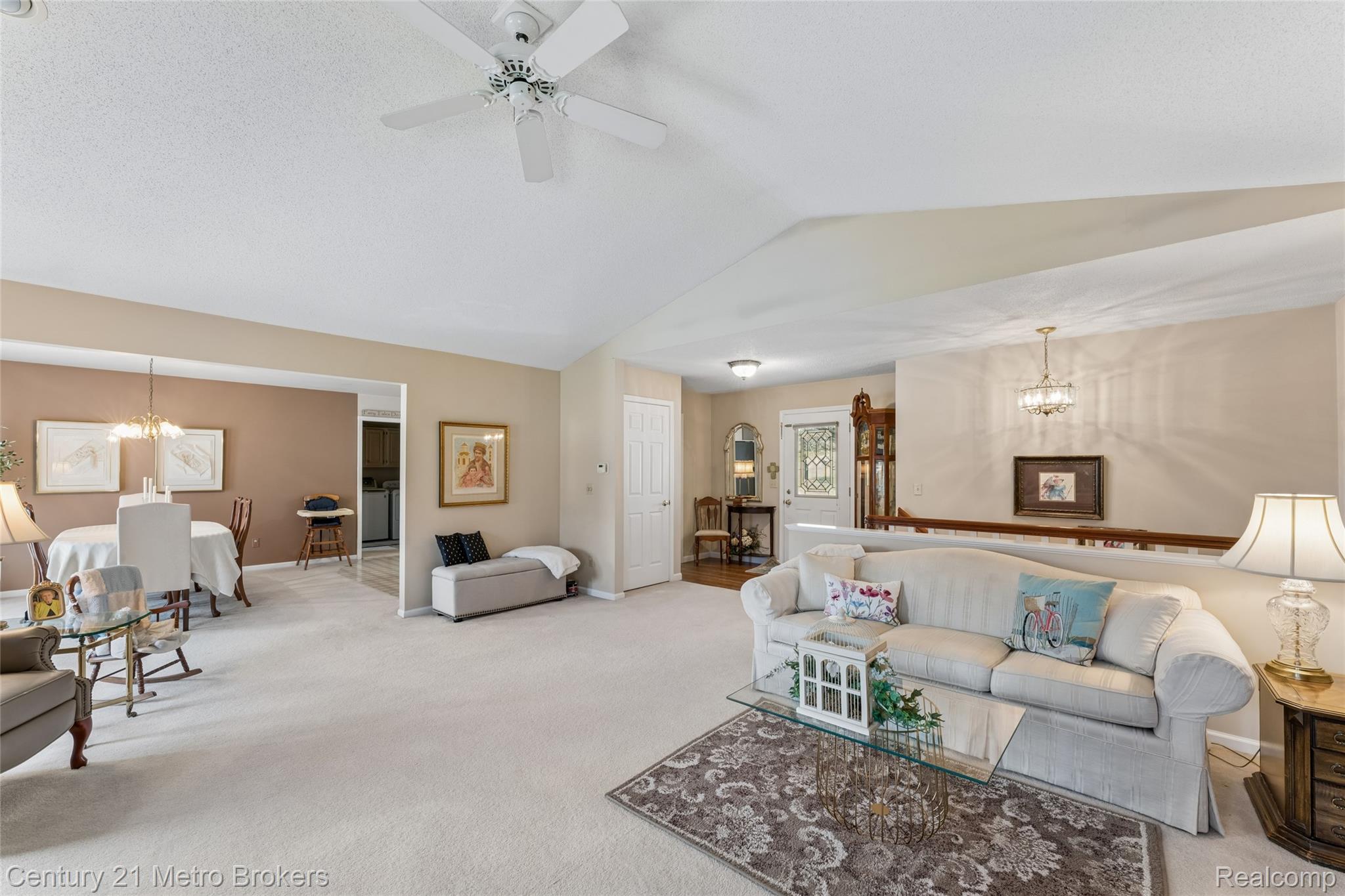 5464 North Seymour Road Flushing, MI 48433 - Photo 16 of 59 Living room with carpet and a ceiling fan