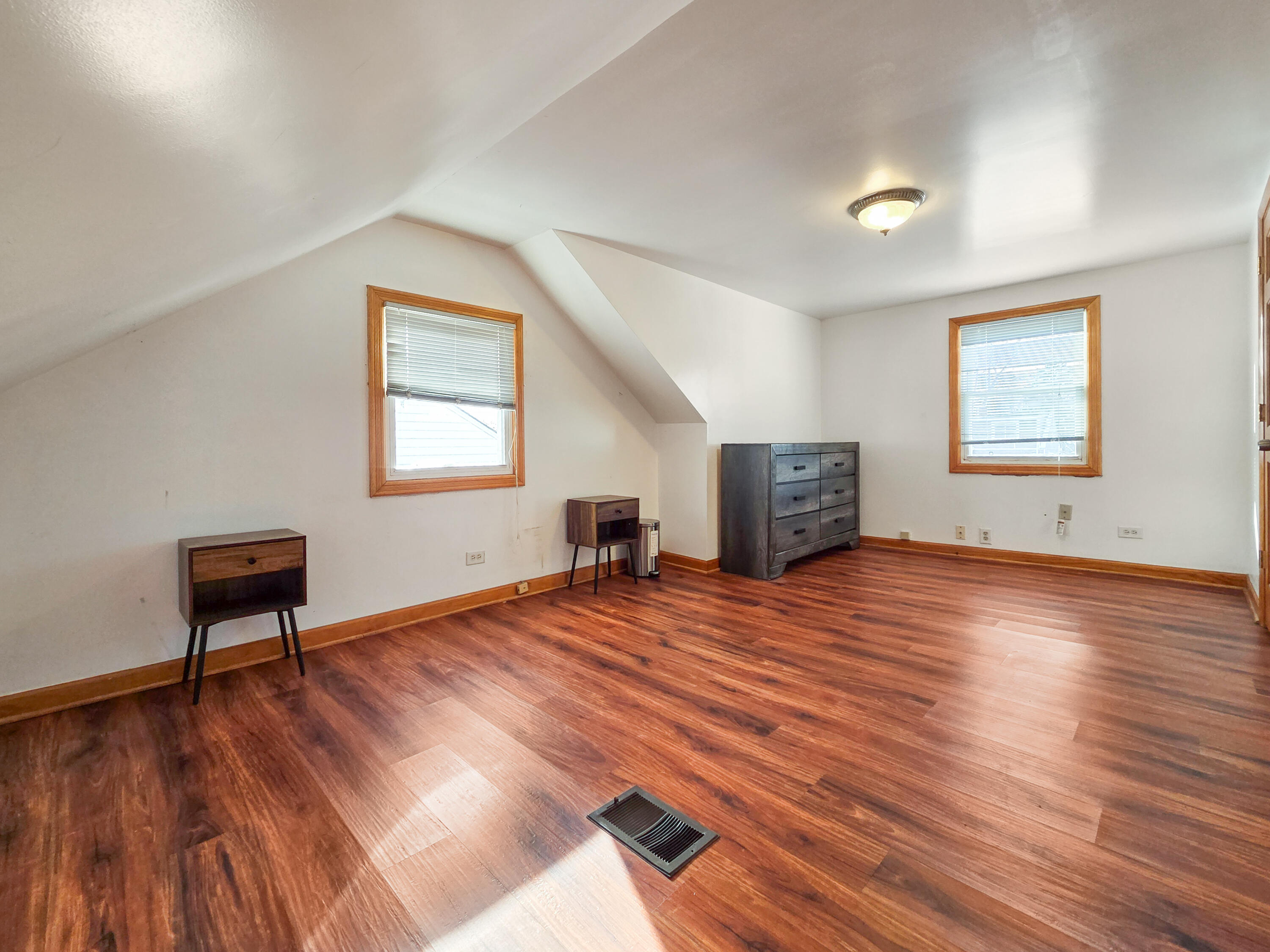 1472 Atlas Street Hammond, IN 46320 - Photo 18 of 27 a view of empty room with wooden floor and window
