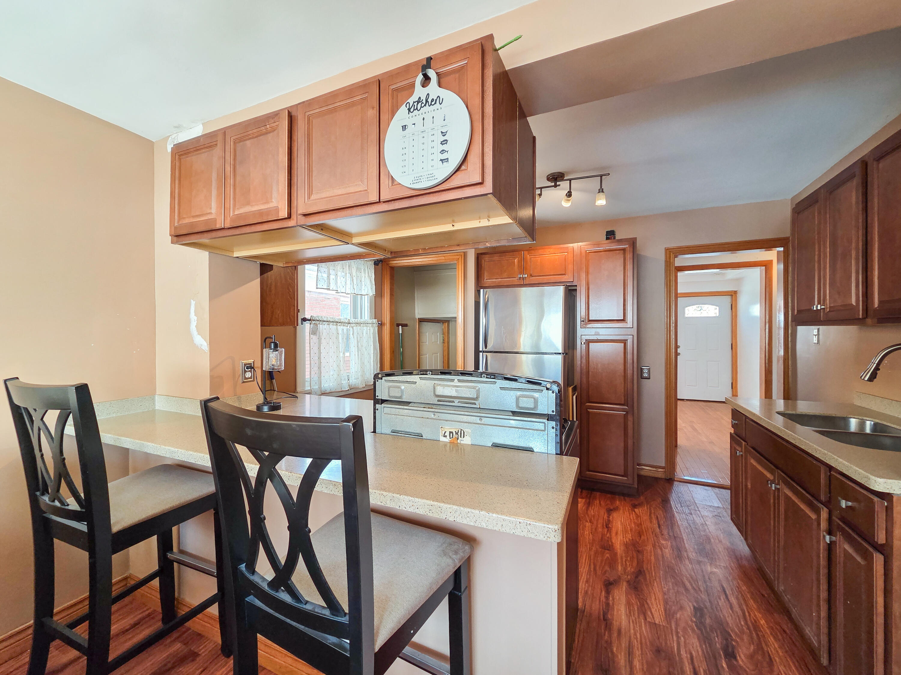1472 Atlas Street Hammond, IN 46320 - Photo 10 of 27 a view of a kitchen with a table and chairs