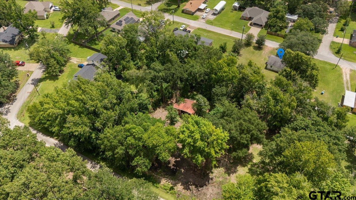Tbd Spring Street Bullard, TX 75757 - Photo 2 of 3 an aerial view of residential house with outdoor space and trees all around