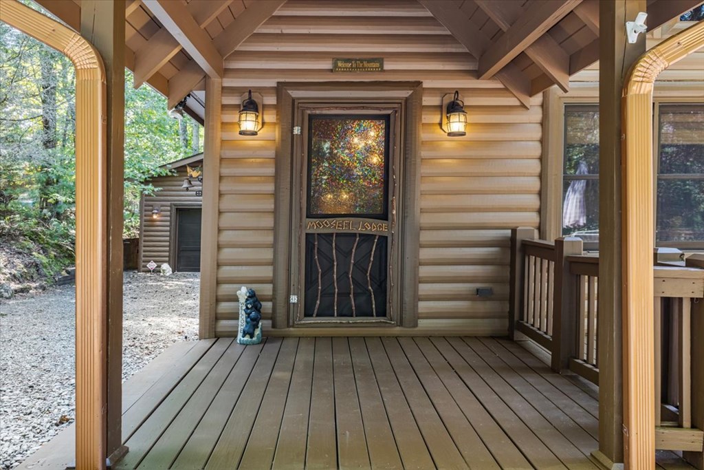 244 Indian Ridge Road Epworth, GA 30541 - Photo 15 of 47 a view of a house with a door and wooden floor
