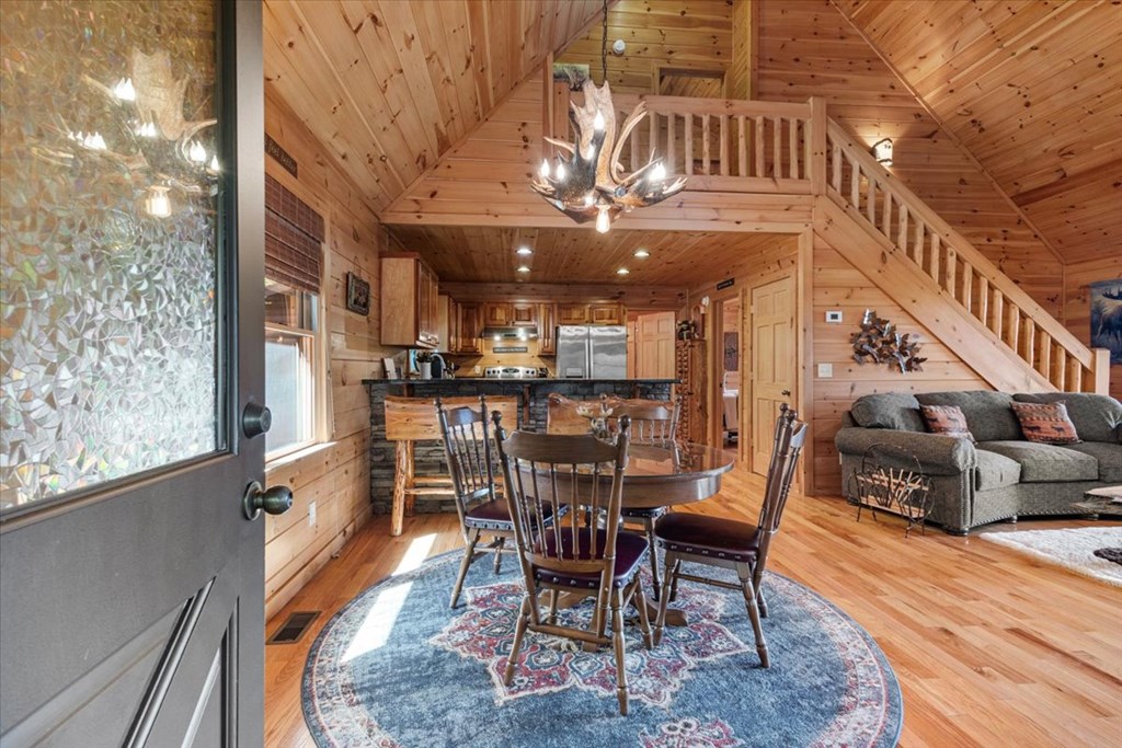 244 Indian Ridge Road Epworth, GA 30541 - Photo 16 of 47 a dining room with furniture and wooden floor