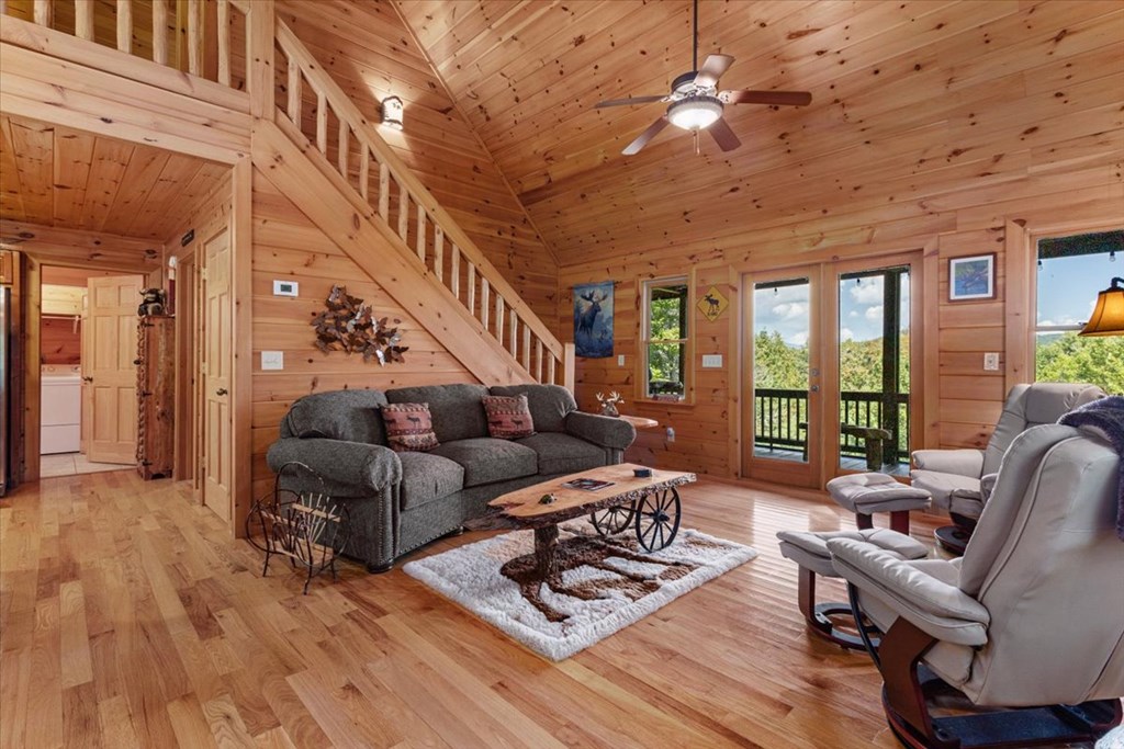 244 Indian Ridge Road Epworth, GA 30541 - Photo 17 of 47 a living room with furniture and a wooden floor