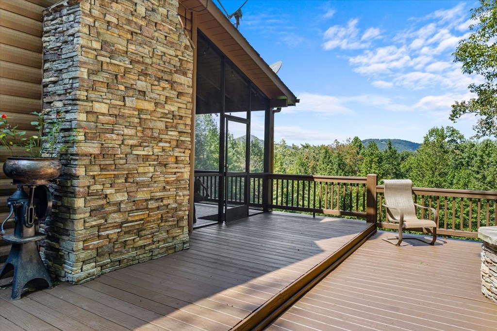 244 Indian Ridge Road Epworth, GA 30541 - Photo 2 of 47 a view of balcony with wooden floor and seating space
