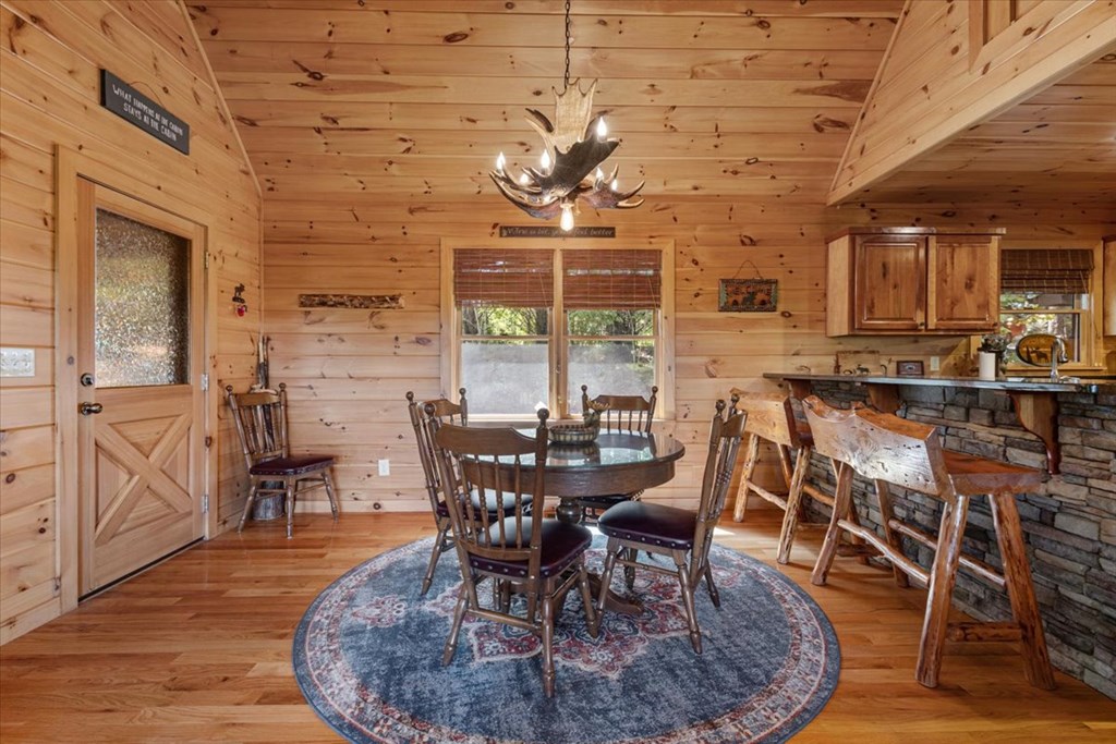244 Indian Ridge Road Epworth, GA 30541 - Photo 21 of 47 a view of a dining room with furniture window and wooden floor
