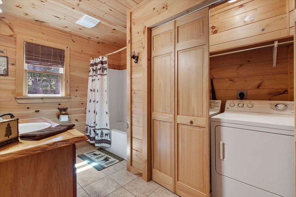 244 Indian Ridge Road Epworth, GA 30541 - Photo 26 of 47 a storage room with washer and dryer