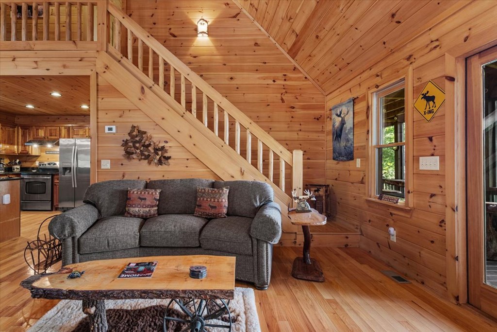 244 Indian Ridge Road Epworth, GA 30541 - Photo 30 of 47 a view of a livingroom with furniture and wooden floor