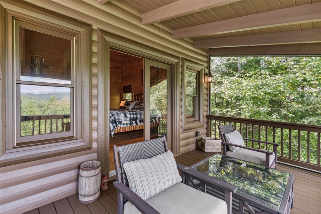 244 Indian Ridge Road Epworth, GA 30541 - Photo 35 of 47 a living room with furniture and a window