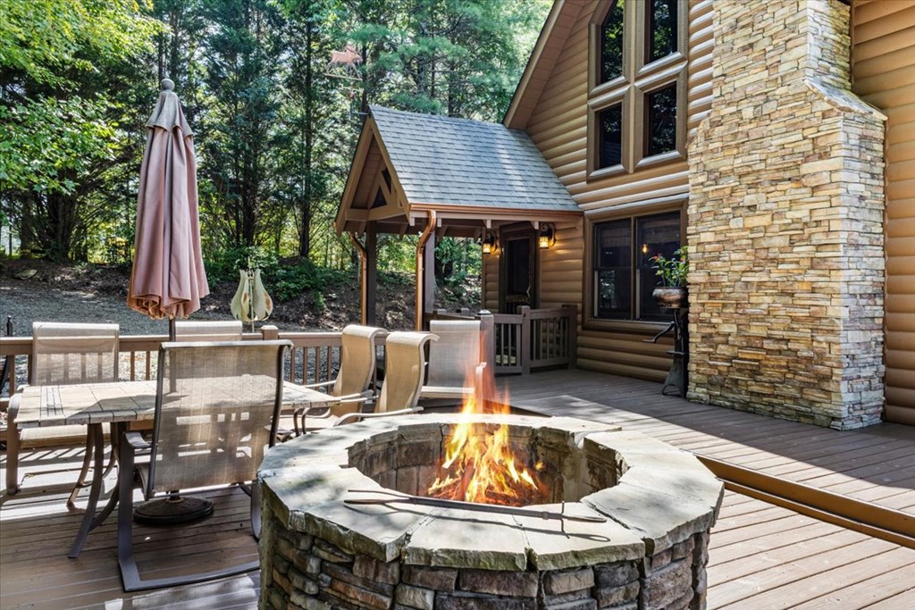 244 Indian Ridge Road Epworth, GA 30541 - Photo 4 of 47 a view of outdoor sitting area with furniture and wooden deck