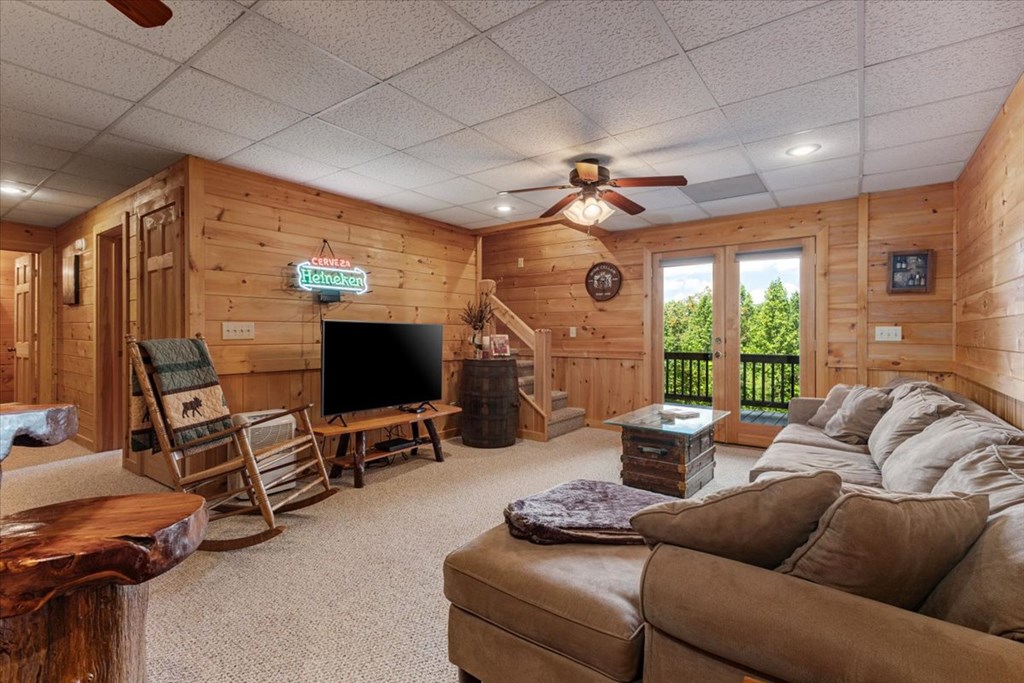 244 Indian Ridge Road Epworth, GA 30541 - Photo 43 of 47 a living room with furniture and a flat screen tv