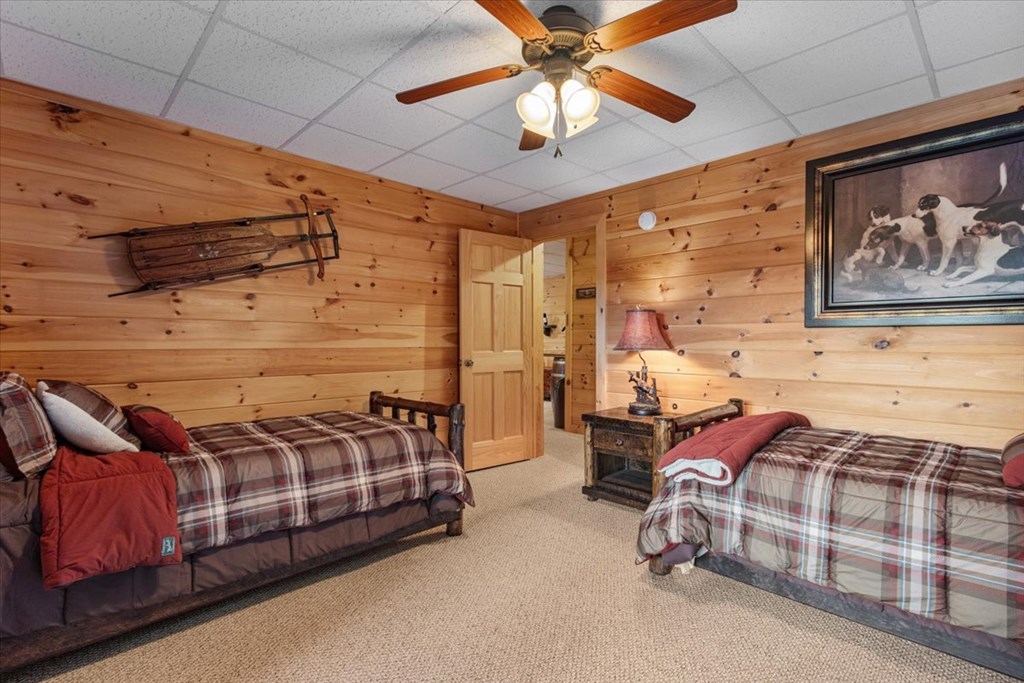 244 Indian Ridge Road Epworth, GA 30541 - Photo 45 of 47 a bed room with a bed and a painting on the wall