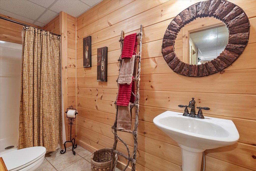 244 Indian Ridge Road Epworth, GA 30541 - Photo 46 of 47 a bathroom with a sink and mirror