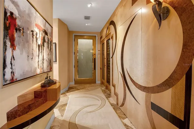 a view of a lake with houses in the back