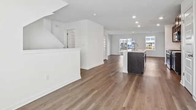 a kitchen with a stove and a sink