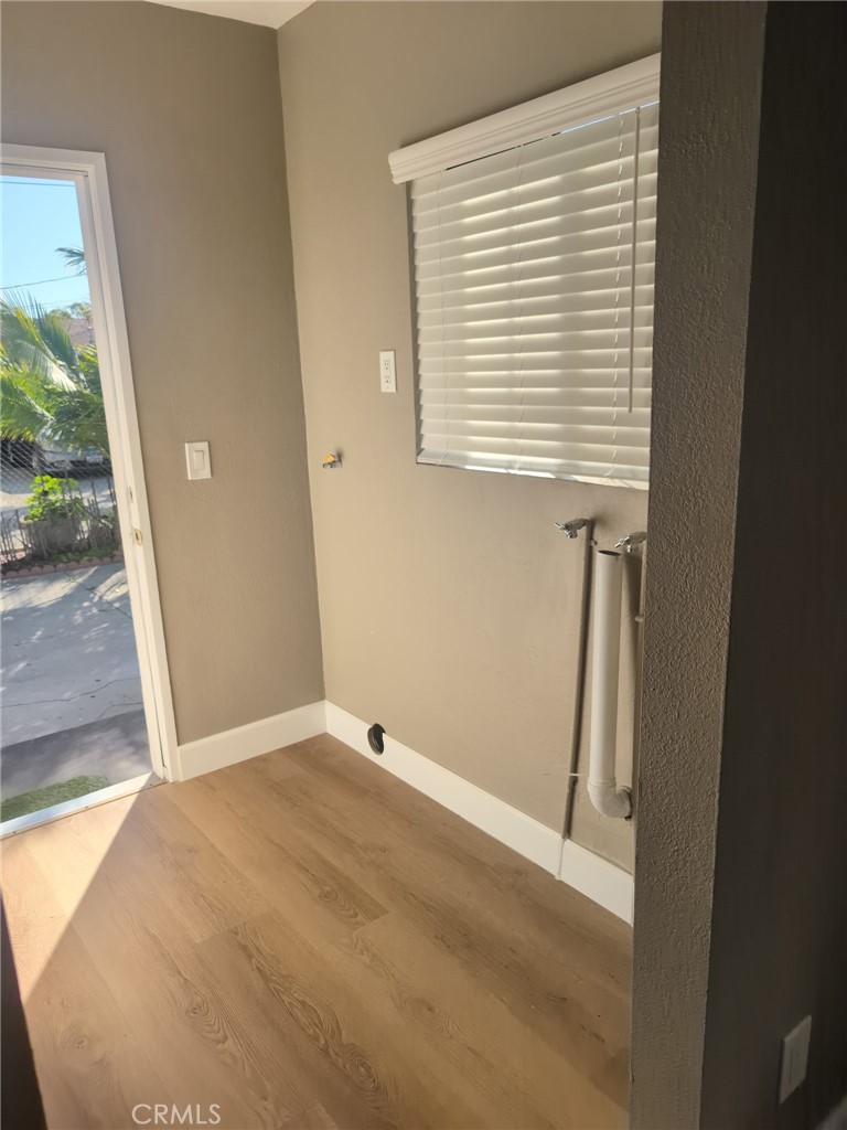 10915 Carmenita Road Whittier, CA 90605 - Photo 13 of 15 a view of an empty room with a window