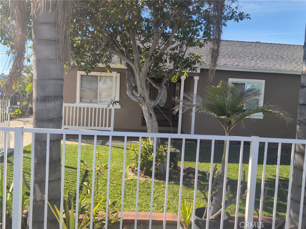 10915 Carmenita Road Whittier, CA 90605 - Photo 3 of 15 a view of a house with a window