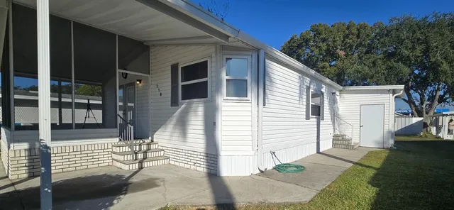 a view of house with a outdoor space