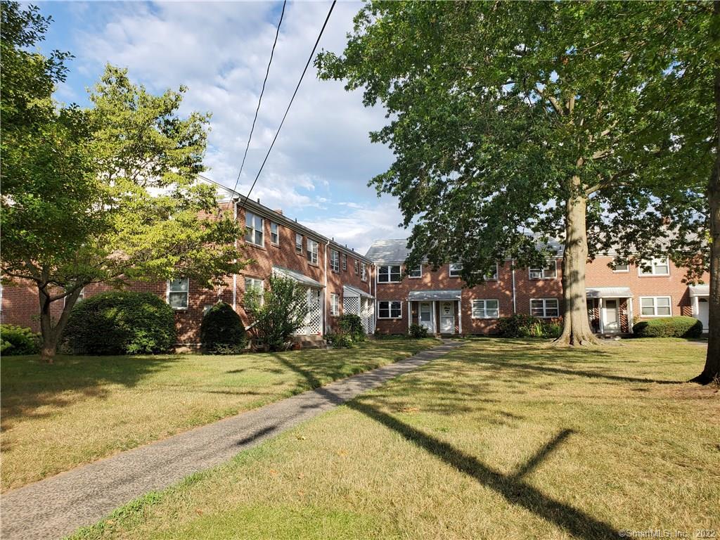 119 Franklin Road, Unit 119 Hamden, CT 06517 - Photo 1 of 1 a view of swimming pool with outdoor seating and trees