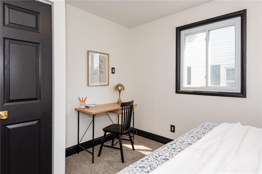 5240 Haverfield Road Dayton, OH 45432 - Photo 36 of 58 This cozy bedroom features a practical workspace and window with natural light.