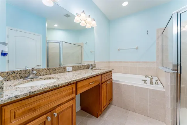 a bathroom with a bathtub and a toilet