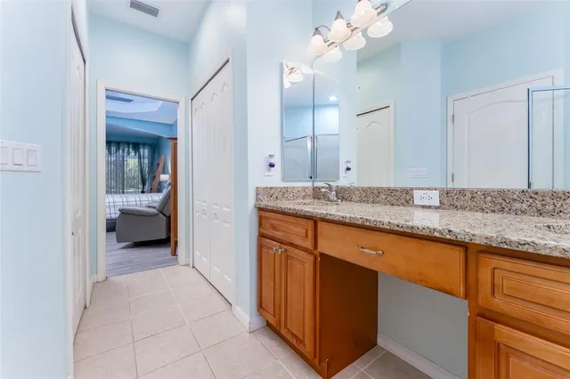 a livingroom with workspace and a window