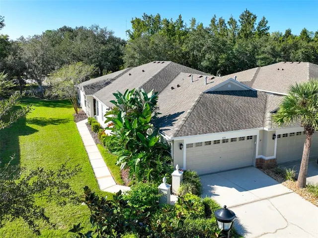 a aerial view of a house with garden