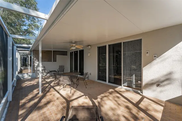 a view of the house with backyard space and porch
