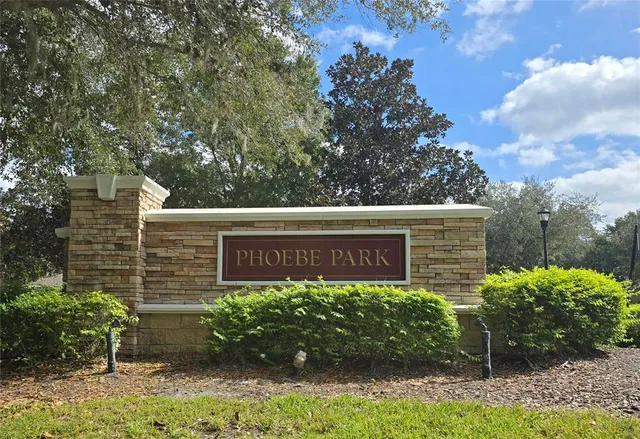 a view of a backyard with a patio