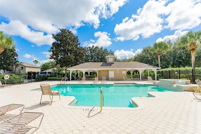 a house view with a sitting space and garden space