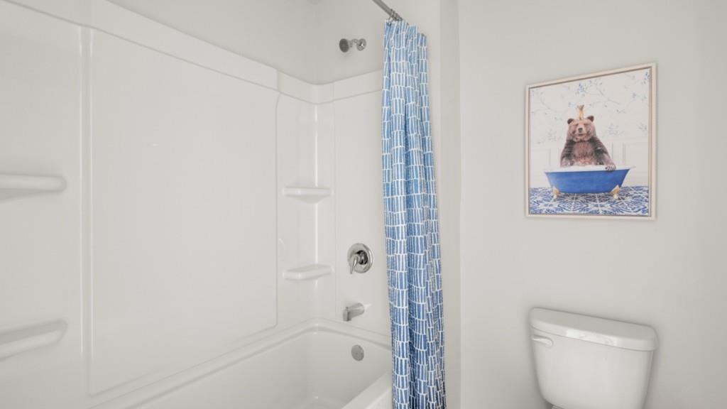 81 Buckthorn Way Dallas, GA 30132 - Photo 26 of 33 a bathroom with a shower a toilet and a sink