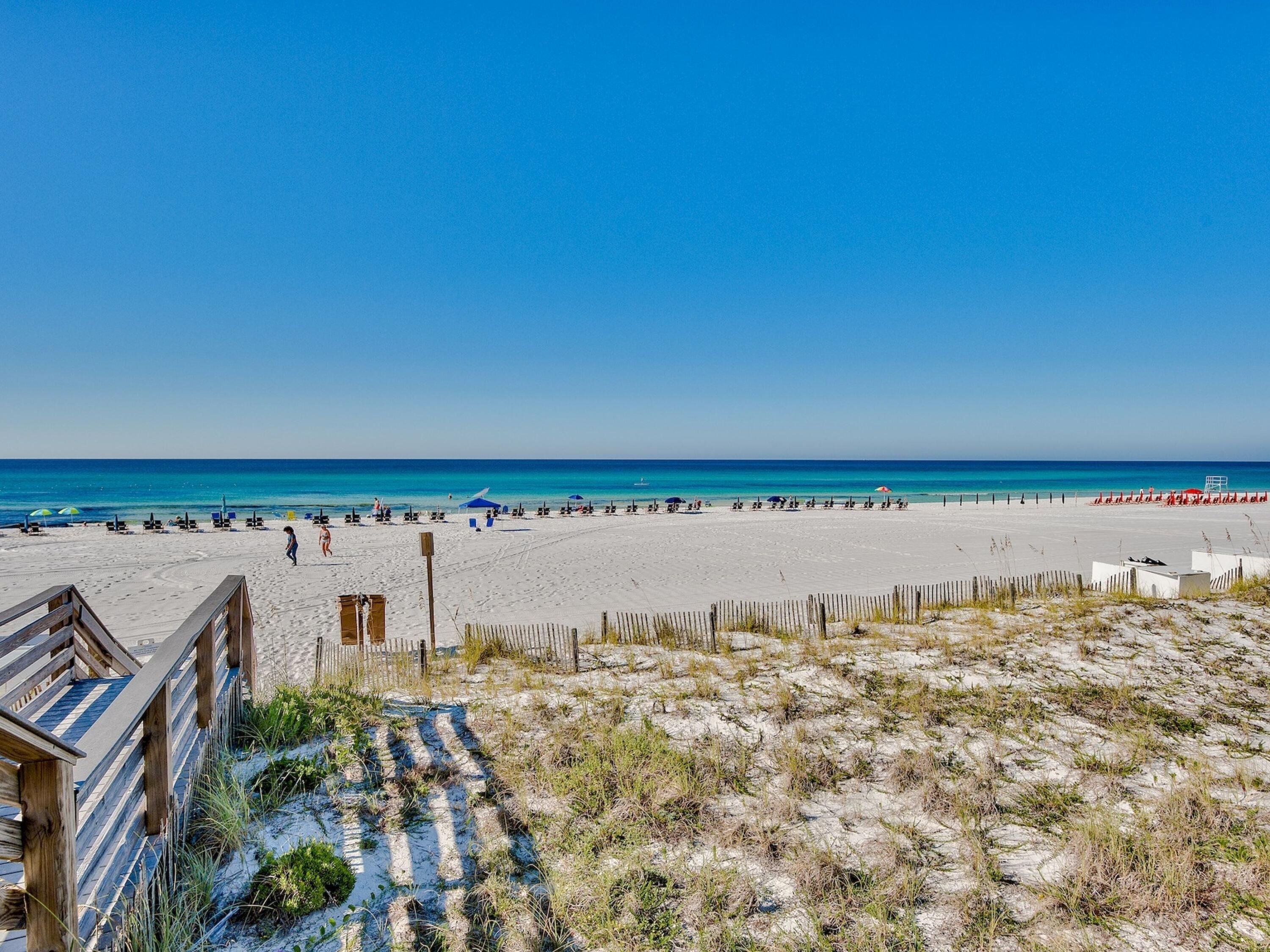 4218 Beachside 2, Unit 218 Miramar Beach, FL 32550 - Photo 28 of 29 a view of a large body of water with a building in the background