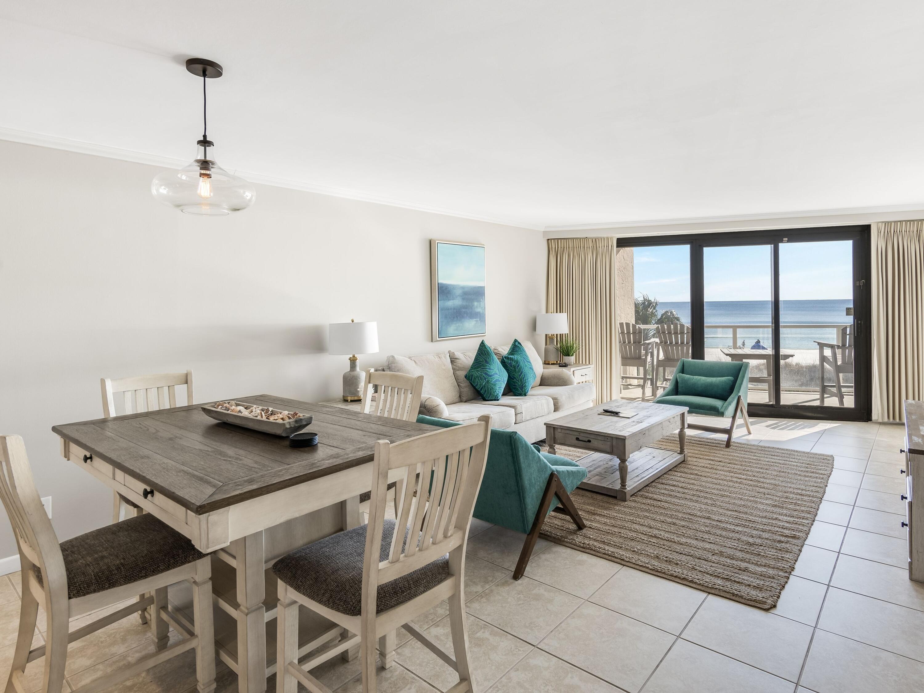 4218 Beachside 2, Unit 218 Miramar Beach, FL 32550 - Photo 5 of 29 a living room with furniture and a table