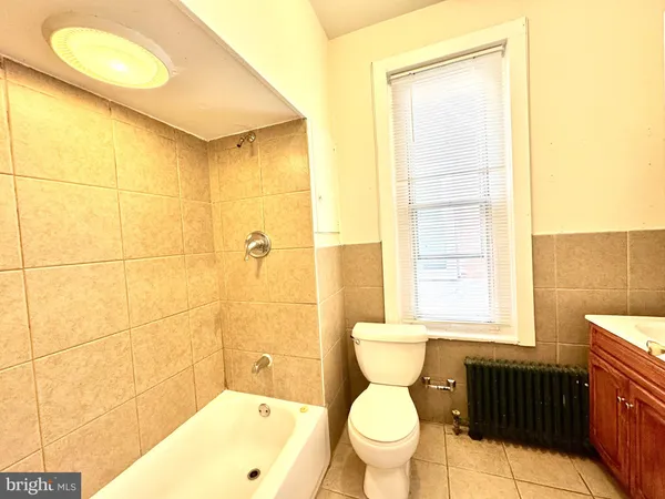 a kitchen with stainless steel appliances granite countertop a refrigerator stove a sink and dishwasher