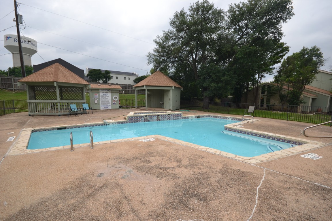 500 Hesters Crossing Road, Unit 205 Round Rock, TX 78681 - Photo 17 of 18 a view of patio with a garden