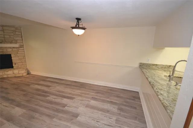 a view of a livingroom with wooden floor