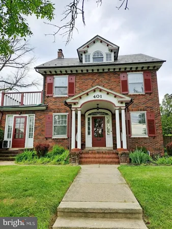 front view of house with a yard