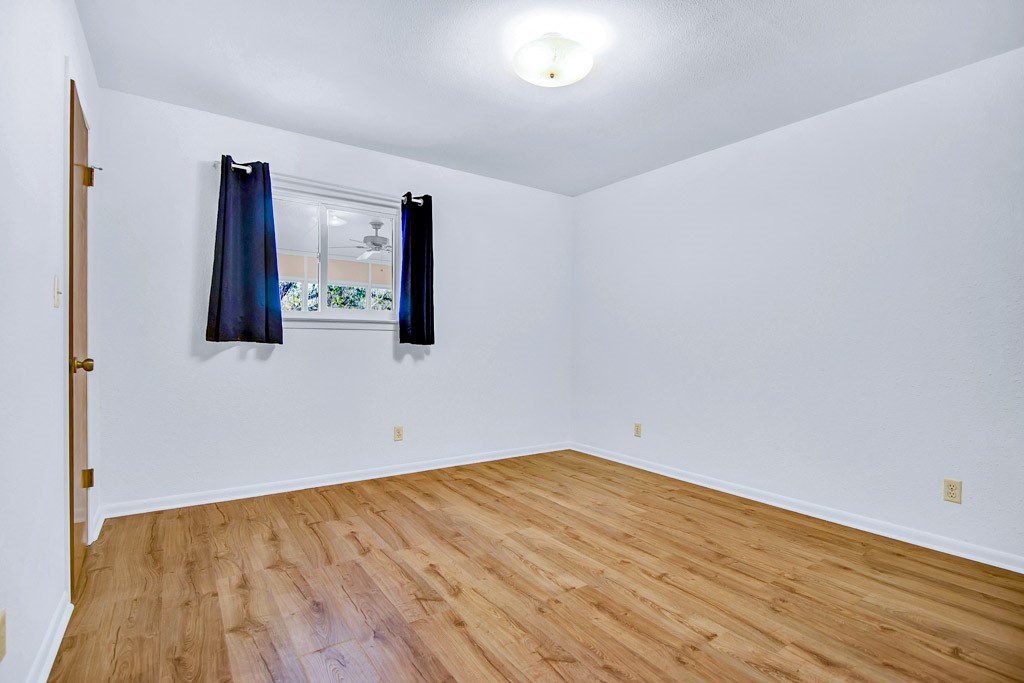298 Jenkins Road Cedar Creek, TX 78612 - Photo 20 of 40 wooden floor in a room
